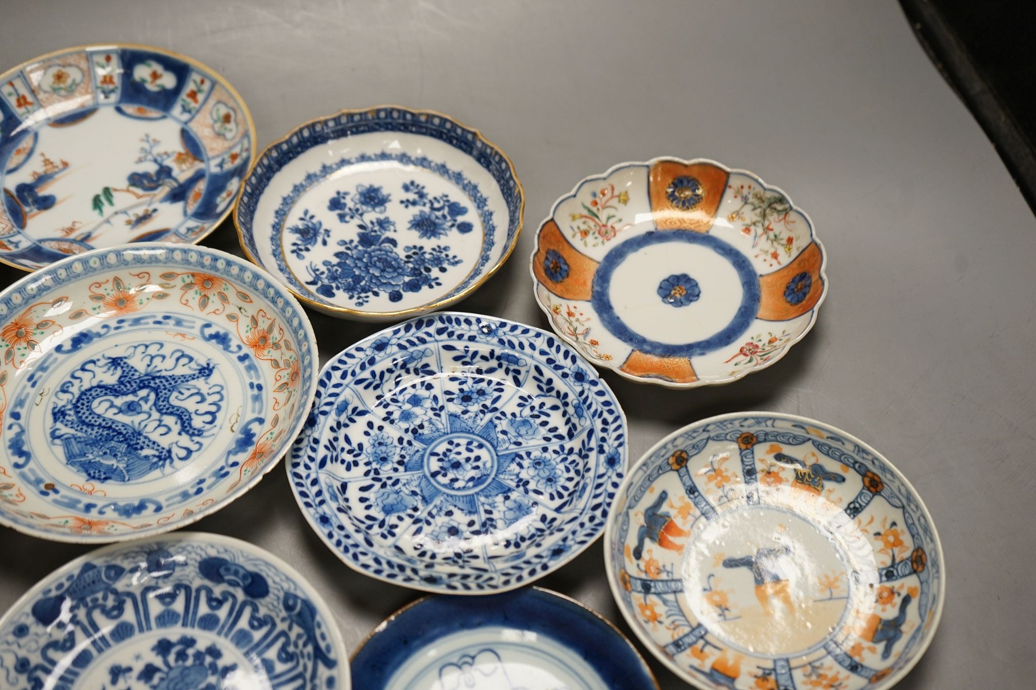 Ten various Chinese porcelain saucer dishes, largest 15cm